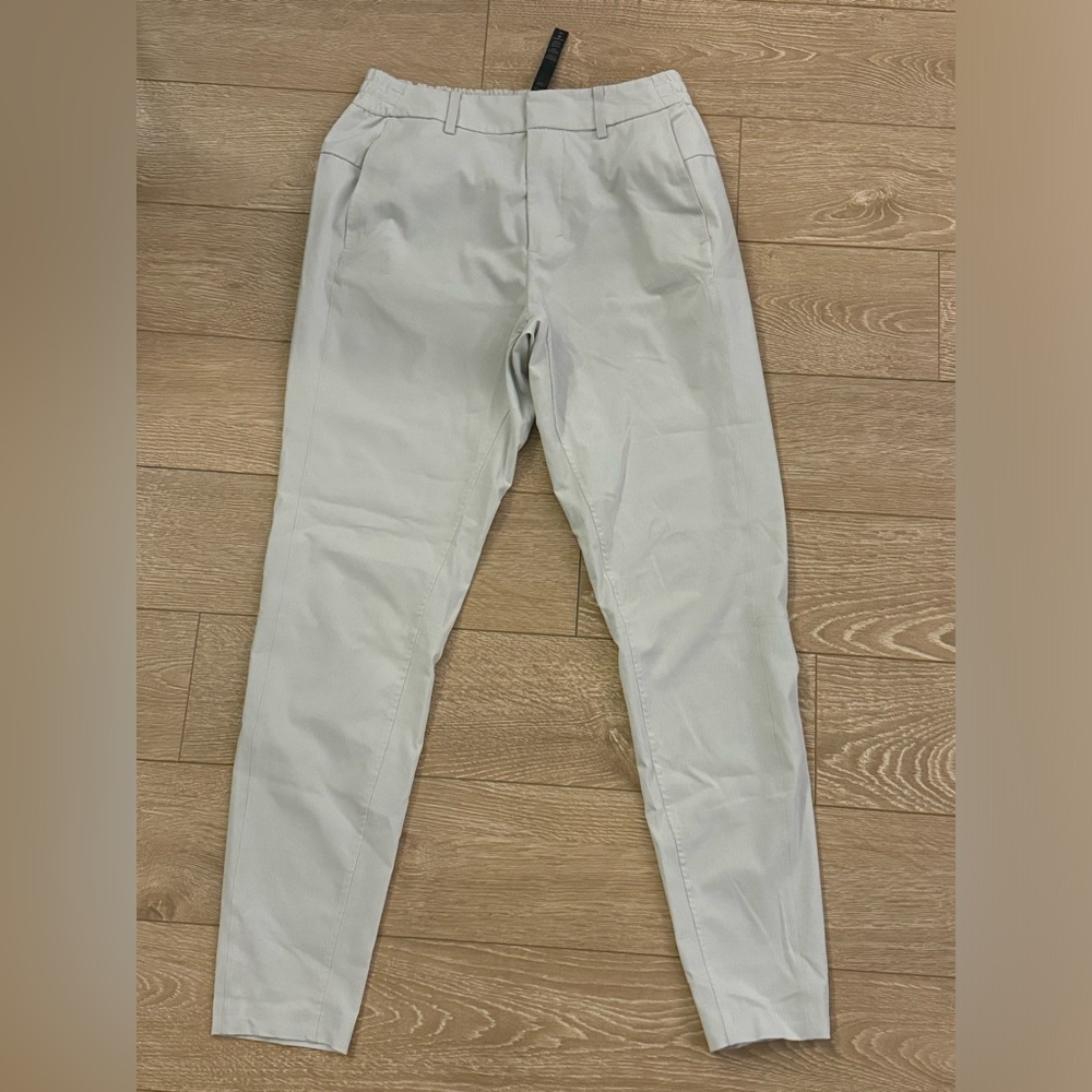 Lululemon shadow light tech pants. never worn